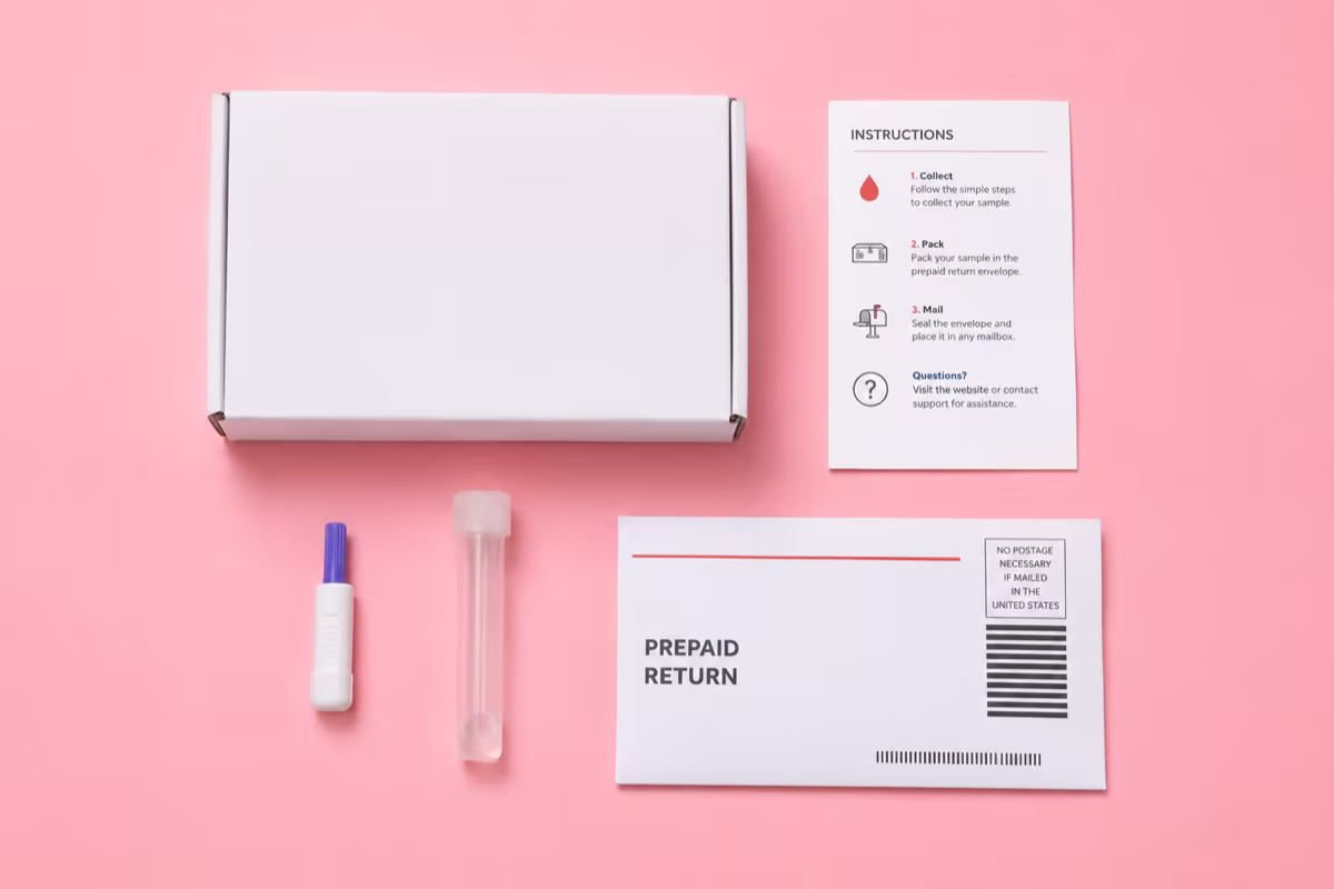 An at-home STI test kit with a box, swab, sample tube, return envelope, and instructions
